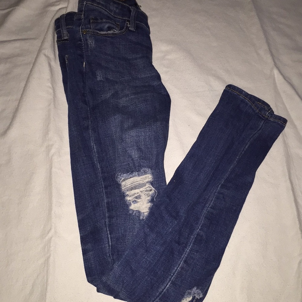 Dark wash jeans with holes